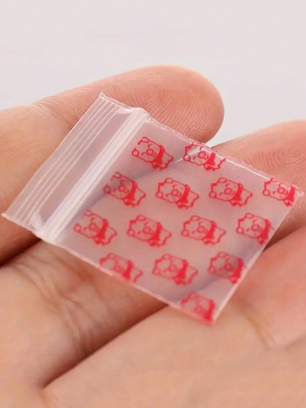 100PCS Pink Piggy Print Ziplock Bag Small Plastic Zipper Bag Portable Packaging for Storing Snacks Cards Jewelry Bag and Other Small Items