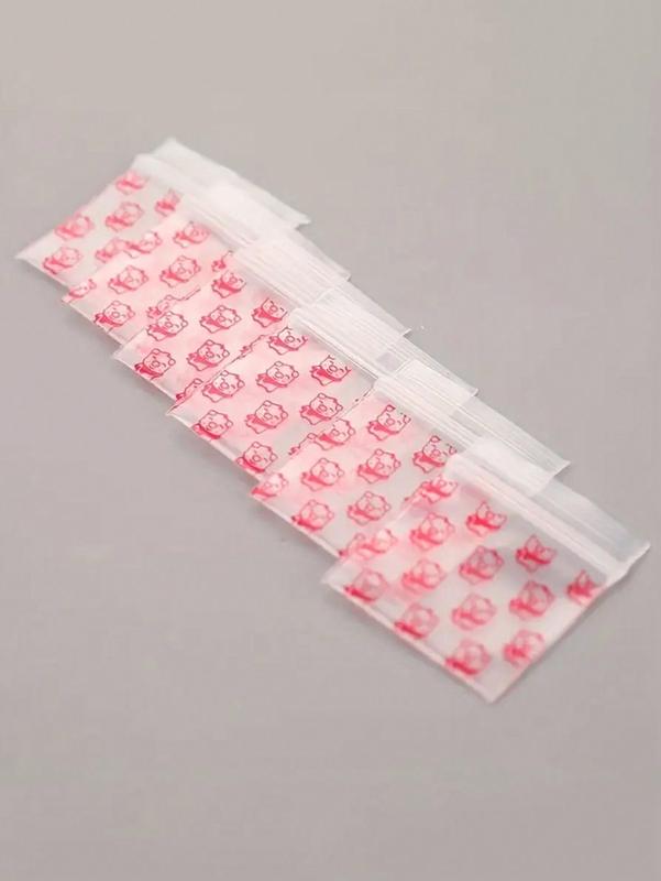 100PCS Pink Piggy Print Ziplock Bag Small Plastic Zipper Bag Portable Packaging for Storing Snacks Cards Jewelry Bag and Other Small Items